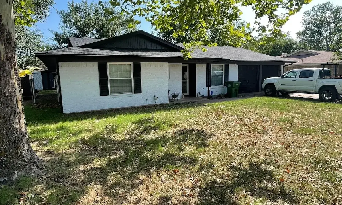 Professional roofing crew working on a residential roof in Los Gatos
